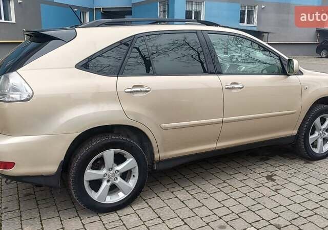 Бежевый Лексус РХ, объемом двигателя 3.46 л и пробегом 246 тыс. км за 11200 $, фото 5 на Automoto.ua