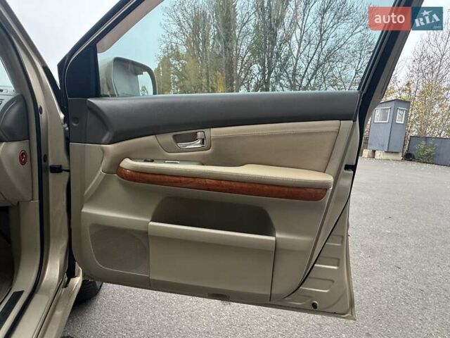 Бежевый Лексус РХ, объемом двигателя 3.46 л и пробегом 228 тыс. км за 10900 $, фото 87 на Automoto.ua