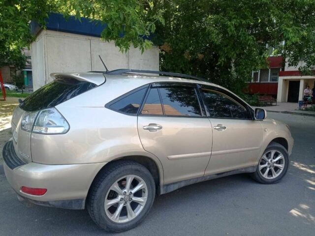 Бежевый Лексус РХ, объемом двигателя 3.5 л и пробегом 198 тыс. км за 10000 $, фото 6 на Automoto.ua