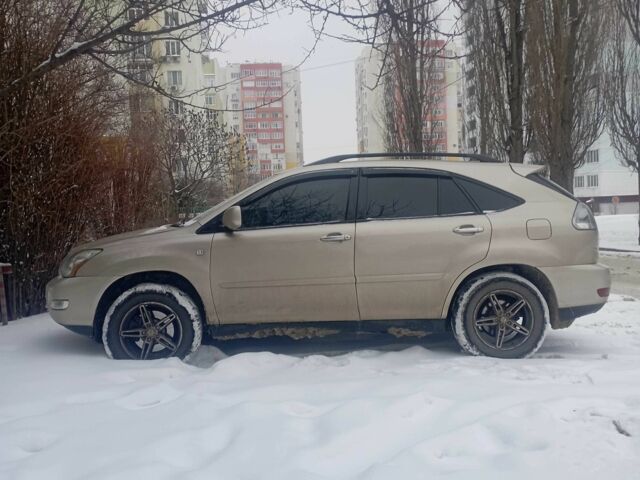 Бежевый Лексус РХ, объемом двигателя 3.5 л и пробегом 198 тыс. км за 10000 $, фото 1 на Automoto.ua