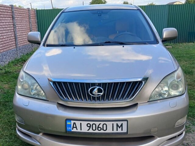 Бежевий Лексус РХ, об'ємом двигуна 3.46 л та пробігом 256 тис. км за 11200 $, фото 1 на Automoto.ua