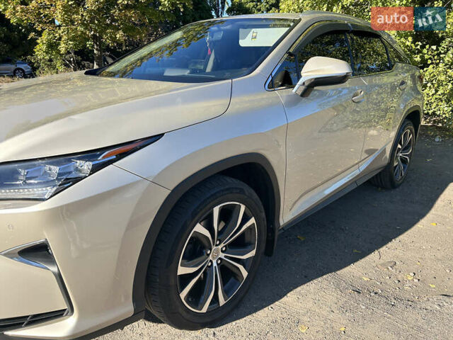 Бежевий Лексус РХ, об'ємом двигуна 2 л та пробігом 178 тис. км за 31000 $, фото 4 на Automoto.ua