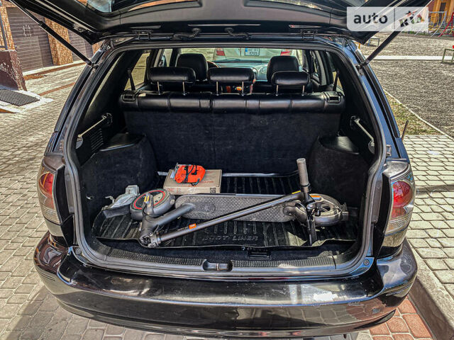 Черный Лексус РХ, объемом двигателя 3 л и пробегом 300 тыс. км за 7500 $, фото 26 на Automoto.ua