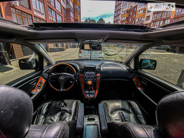Черный Лексус РХ, объемом двигателя 3 л и пробегом 300 тыс. км за 7500 $, фото 27 на Automoto.ua