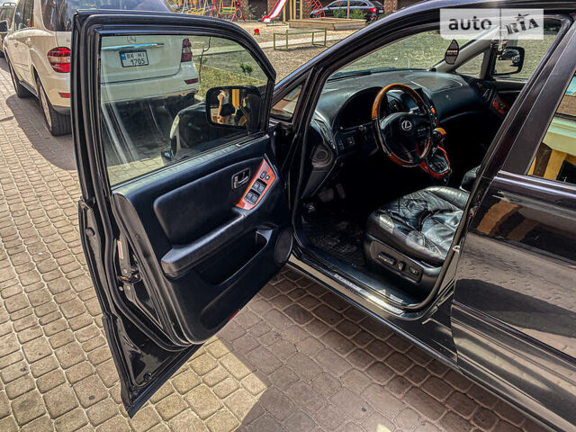 Черный Лексус РХ, объемом двигателя 3 л и пробегом 300 тыс. км за 7500 $, фото 17 на Automoto.ua