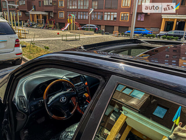 Черный Лексус РХ, объемом двигателя 3 л и пробегом 300 тыс. км за 7500 $, фото 23 на Automoto.ua