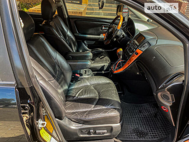 Черный Лексус РХ, объемом двигателя 3 л и пробегом 300 тыс. км за 7500 $, фото 13 на Automoto.ua