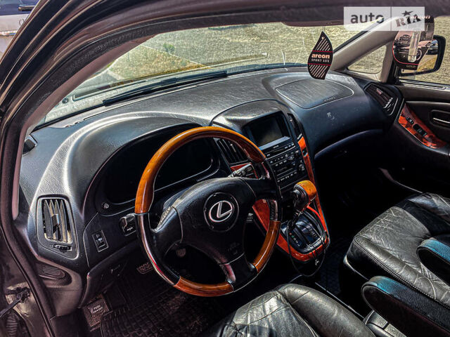 Черный Лексус РХ, объемом двигателя 3 л и пробегом 300 тыс. км за 7500 $, фото 21 на Automoto.ua