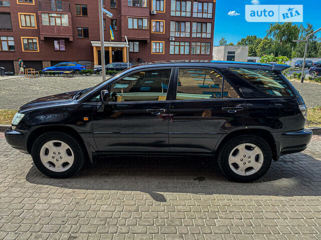 Чорний Лексус РХ, об'ємом двигуна 3 л та пробігом 300 тис. км за 7500 $, фото 4 на Automoto.ua
