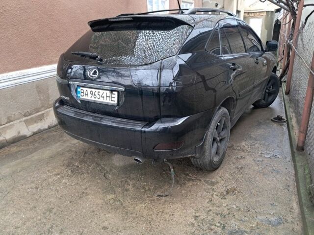 Черный Лексус РХ, объемом двигателя 3.3 л и пробегом 336 тыс. км за 9500 $, фото 1 на Automoto.ua