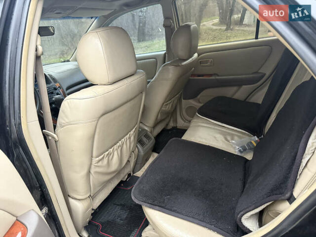 Черный Лексус РХ, объемом двигателя 3 л и пробегом 222 тыс. км за 5500 $, фото 5 на Automoto.ua