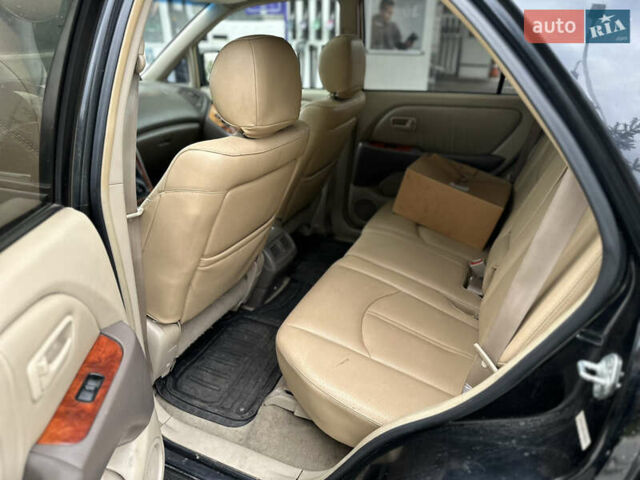 Черный Лексус РХ, объемом двигателя 3 л и пробегом 328 тыс. км за 7600 $, фото 7 на Automoto.ua