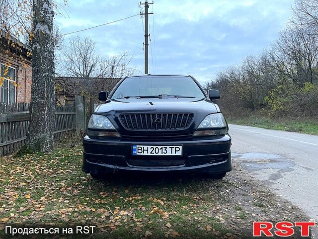 Черный Лексус РХ, объемом двигателя 3 л и пробегом 211 тыс. км за 5000 $, фото 1 на Automoto.ua