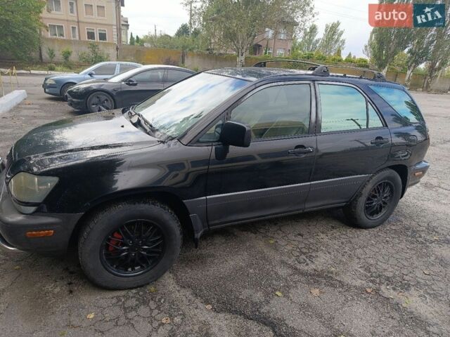 Чорний Лексус РХ, об'ємом двигуна 3 л та пробігом 1 тис. км за 6500 $, фото 1 на Automoto.ua