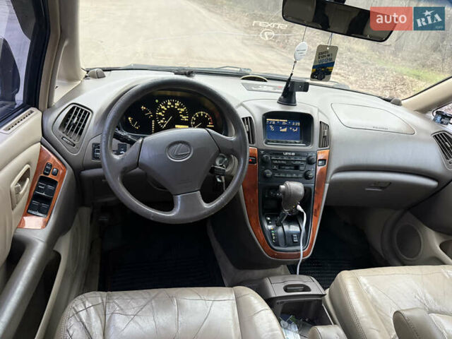 Черный Лексус РХ, объемом двигателя 3 л и пробегом 222 тыс. км за 5500 $, фото 6 на Automoto.ua