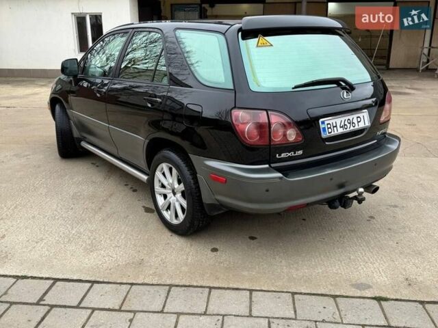 Черный Лексус РХ, объемом двигателя 3 л и пробегом 430 тыс. км за 6200 $, фото 6 на Automoto.ua