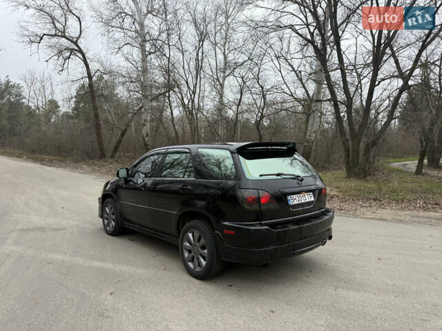 Черный Лексус РХ, объемом двигателя 3 л и пробегом 222 тыс. км за 5500 $, фото 2 на Automoto.ua