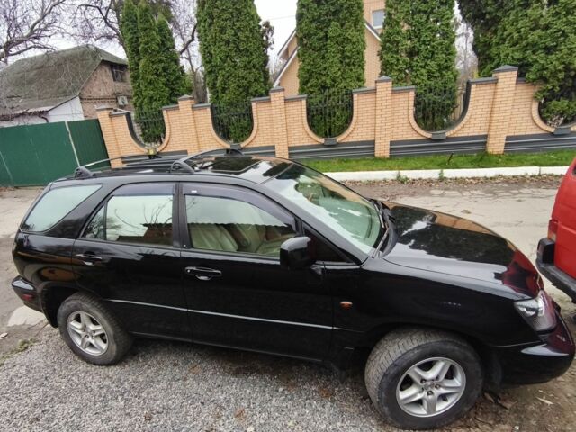 Черный Лексус РХ, объемом двигателя 3 л и пробегом 73 тыс. км за 7500 $, фото 2 на Automoto.ua