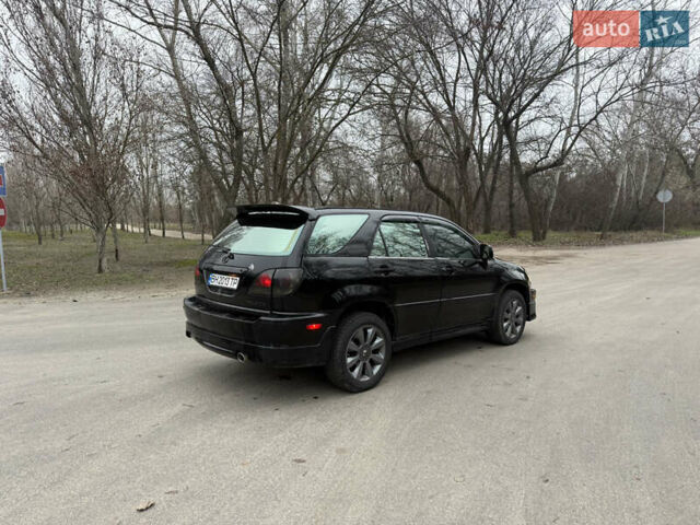 Черный Лексус РХ, объемом двигателя 3 л и пробегом 222 тыс. км за 5500 $, фото 3 на Automoto.ua