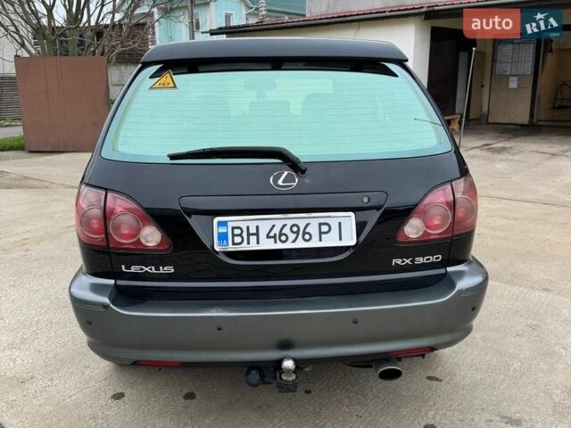 Черный Лексус РХ, объемом двигателя 3 л и пробегом 430 тыс. км за 6200 $, фото 5 на Automoto.ua