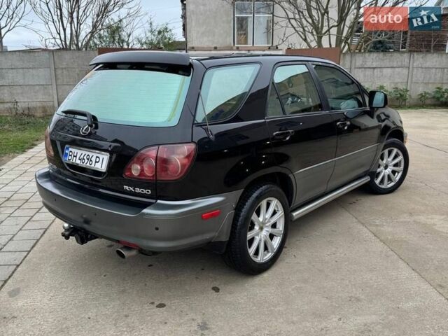 Черный Лексус РХ, объемом двигателя 3 л и пробегом 430 тыс. км за 6200 $, фото 4 на Automoto.ua