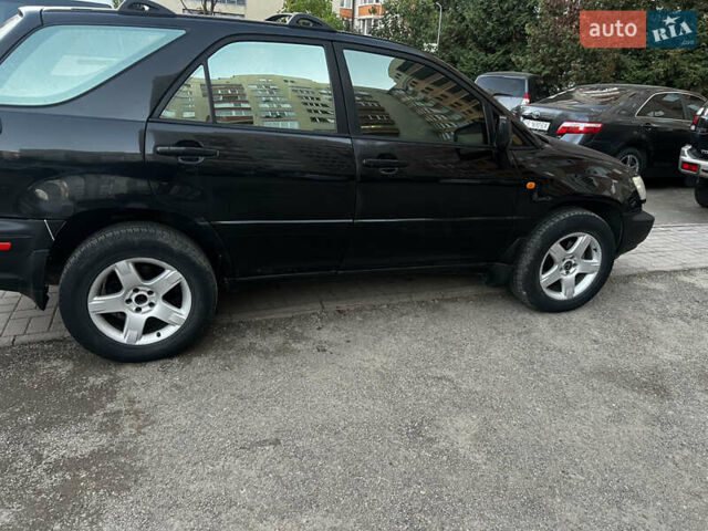 Черный Лексус РХ, объемом двигателя 3 л и пробегом 230 тыс. км за 4800 $, фото 2 на Automoto.ua