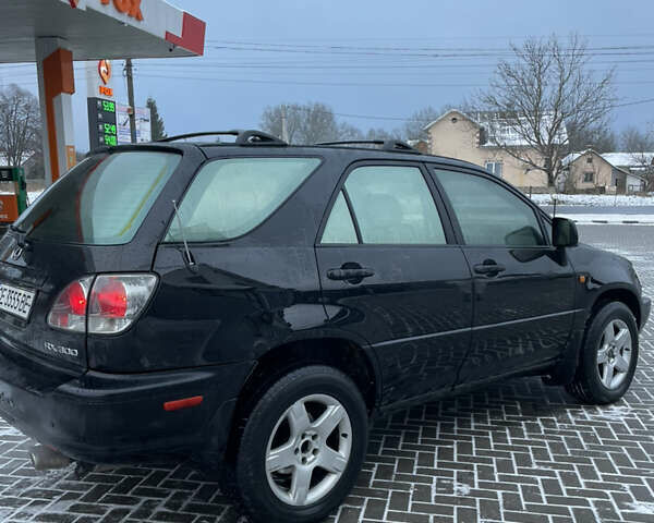 Чорний Лексус РХ, об'ємом двигуна 3 л та пробігом 285 тис. км за 5800 $, фото 4 на Automoto.ua