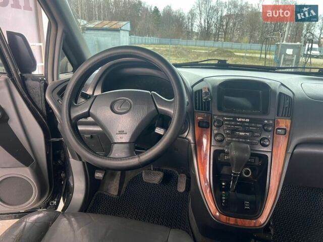 Черный Лексус РХ, объемом двигателя 3 л и пробегом 300 тыс. км за 4999 $, фото 27 на Automoto.ua