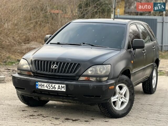 Черный Лексус РХ, объемом двигателя 3 л и пробегом 300 тыс. км за 4999 $, фото 1 на Automoto.ua