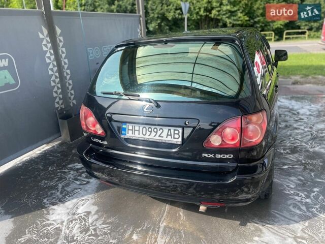 Черный Лексус РХ, объемом двигателя 3 л и пробегом 310 тыс. км за 6000 $, фото 1 на Automoto.ua