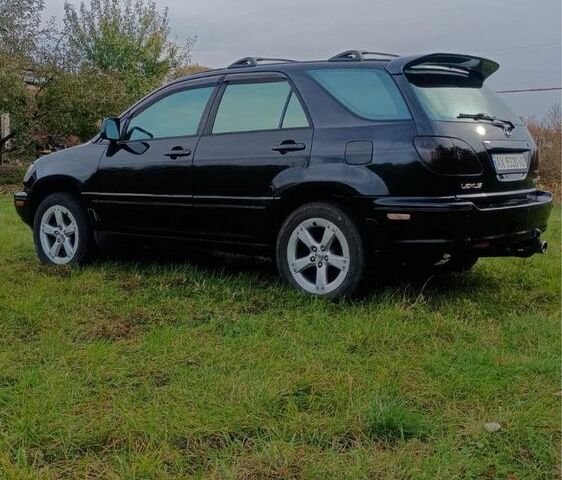 Чорний Лексус РХ, об'ємом двигуна 3 л та пробігом 200 тис. км за 4777 $, фото 2 на Automoto.ua