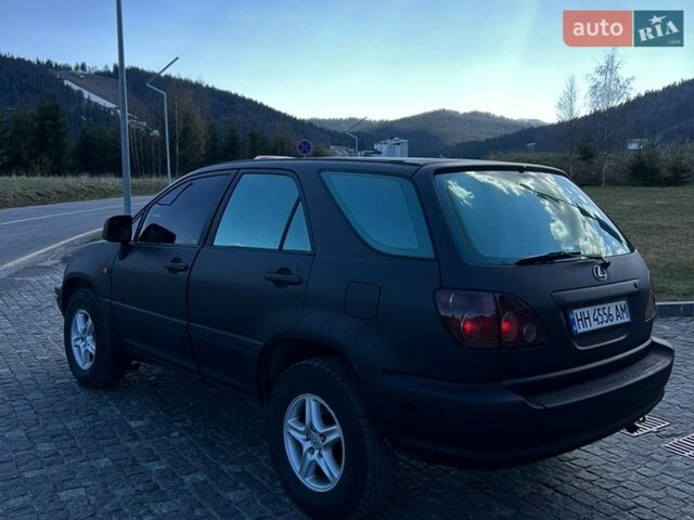 Черный Лексус РХ, объемом двигателя 3 л и пробегом 300 тыс. км за 4999 $, фото 4 на Automoto.ua