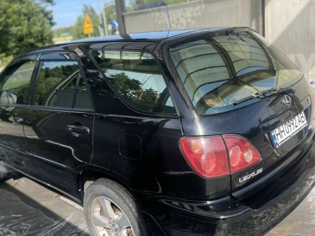 Чорний Лексус РХ, об'ємом двигуна 3 л та пробігом 310 тис. км за 6577 $, фото 3 на Automoto.ua