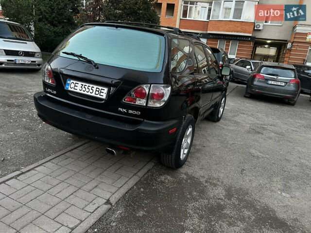 Черный Лексус РХ, объемом двигателя 3 л и пробегом 230 тыс. км за 4800 $, фото 4 на Automoto.ua