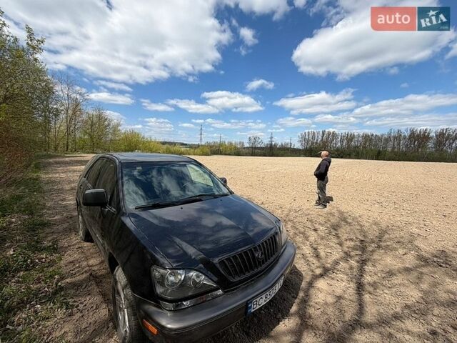 Черный Лексус РХ, объемом двигателя 3 л и пробегом 286 тыс. км за 5300 $, фото 1 на Automoto.ua