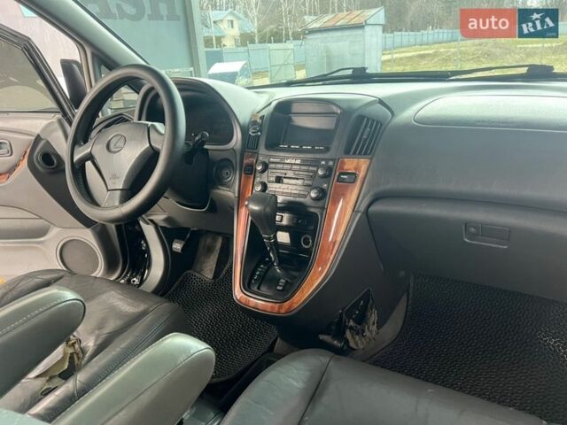 Черный Лексус РХ, объемом двигателя 3 л и пробегом 300 тыс. км за 4999 $, фото 25 на Automoto.ua