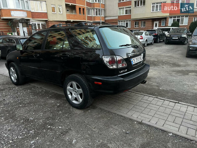 Черный Лексус РХ, объемом двигателя 3 л и пробегом 230 тыс. км за 4800 $, фото 3 на Automoto.ua