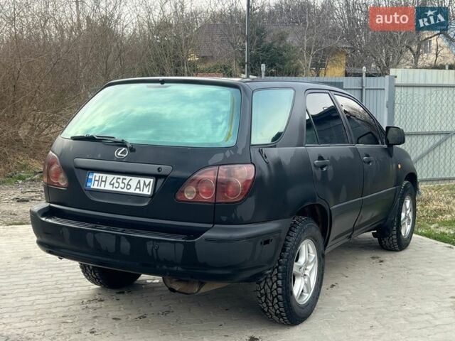 Черный Лексус РХ, объемом двигателя 3 л и пробегом 300 тыс. км за 4999 $, фото 18 на Automoto.ua