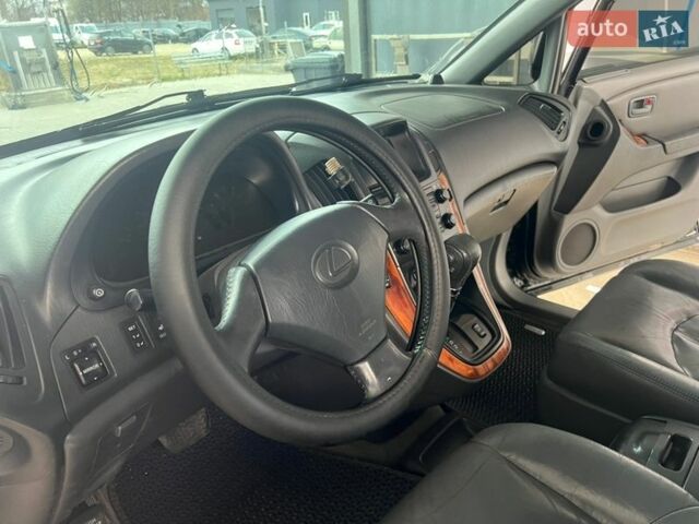 Черный Лексус РХ, объемом двигателя 3 л и пробегом 300 тыс. км за 4999 $, фото 31 на Automoto.ua