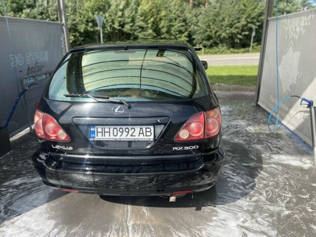 Чорний Лексус РХ, об'ємом двигуна 3 л та пробігом 310 тис. км за 6577 $, фото 4 на Automoto.ua