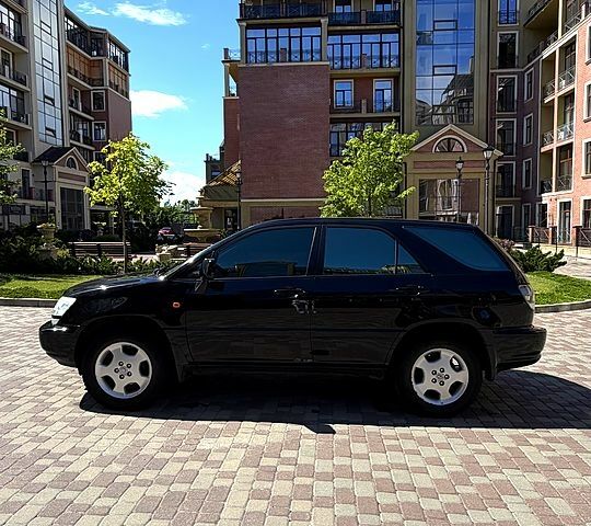 Черный Лексус РХ, объемом двигателя 3 л и пробегом 228 тыс. км за 7600 $, фото 3 на Automoto.ua