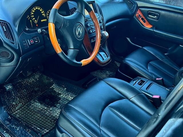 Чорний Лексус РХ, об'ємом двигуна 3 л та пробігом 290 тис. км за 5900 $, фото 3 на Automoto.ua