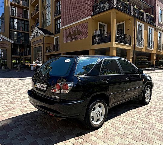 Черный Лексус РХ, объемом двигателя 3 л и пробегом 228 тыс. км за 7600 $, фото 4 на Automoto.ua