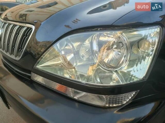 Черный Лексус РХ, объемом двигателя 3 л и пробегом 350 тыс. км за 6200 $, фото 13 на Automoto.ua