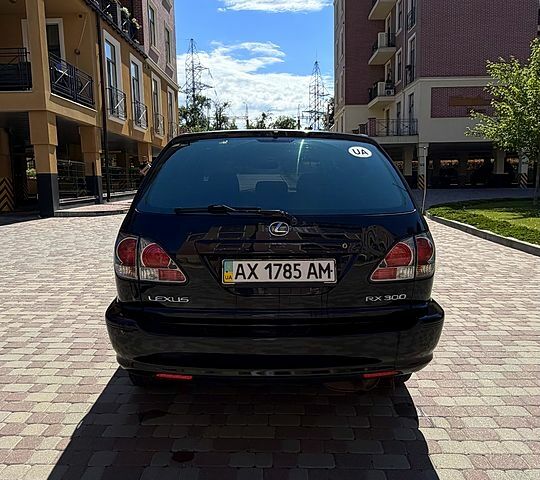 Черный Лексус РХ, объемом двигателя 3 л и пробегом 228 тыс. км за 7600 $, фото 2 на Automoto.ua