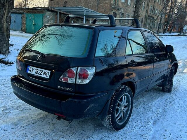 Чорний Лексус РХ, об'ємом двигуна 3 л та пробігом 290 тис. км за 5900 $, фото 2 на Automoto.ua