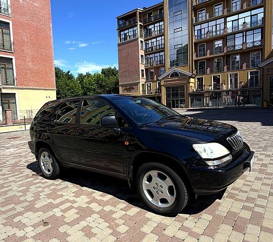 Черный Лексус РХ, объемом двигателя 3 л и пробегом 228 тыс. км за 7600 $, фото 1 на Automoto.ua