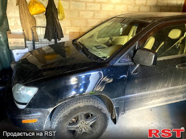 Черный Лексус РХ, объемом двигателя 3 л и пробегом 500 тыс. км за 6500 $, фото 1 на Automoto.ua