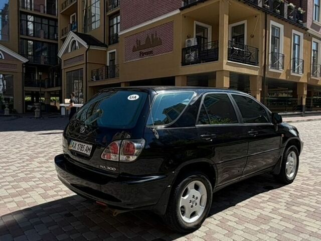 Чорний Лексус РХ, об'ємом двигуна 3 л та пробігом 228 тис. км за 7600 $, фото 2 на Automoto.ua