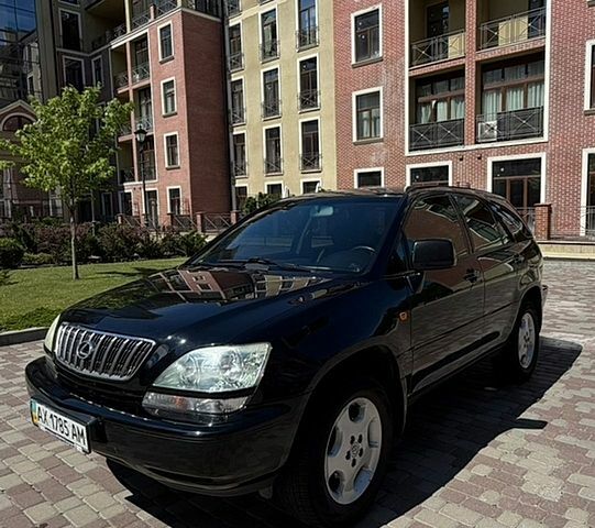 Чорний Лексус РХ, об'ємом двигуна 3 л та пробігом 228 тис. км за 7600 $, фото 3 на Automoto.ua